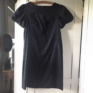 Black minidress with puffed sleeve